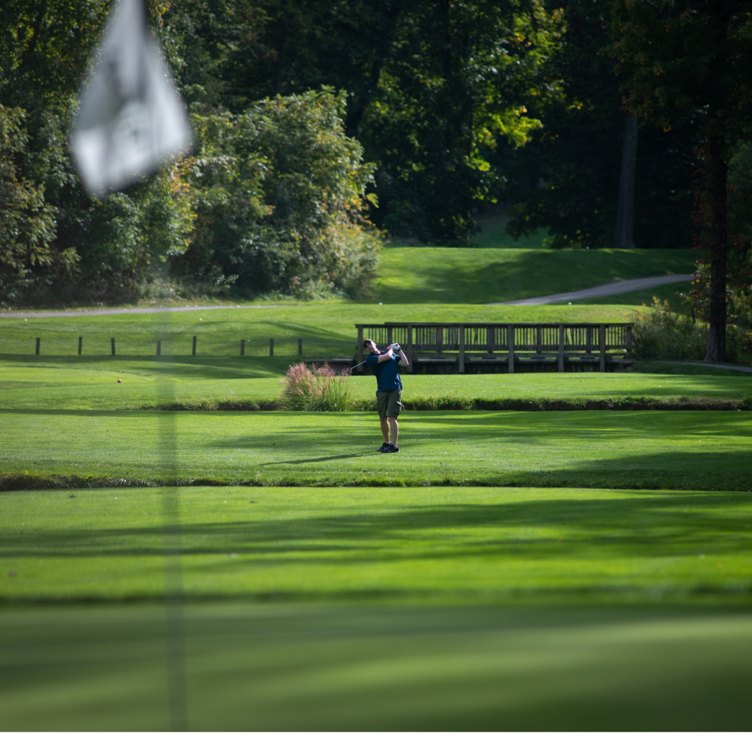 man golfing