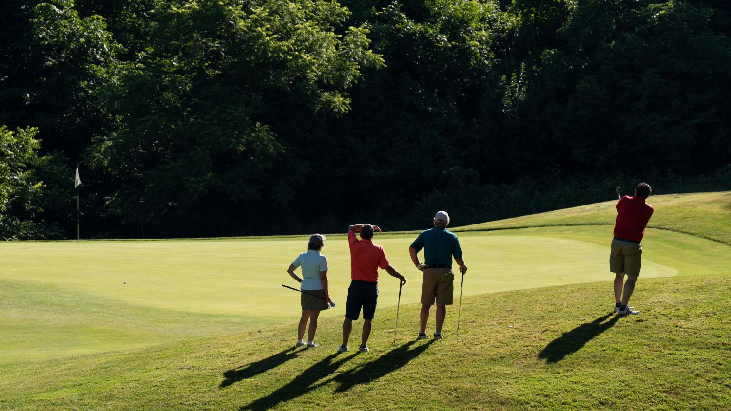 Golfers on green