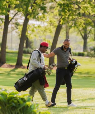 golfers walking on course