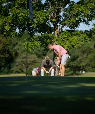 putting at golf course