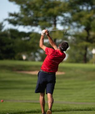 man golfing