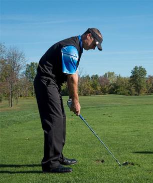 Golfer practicing